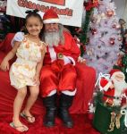 visita do papai noel para a noite do acampamento na escola e  residências  