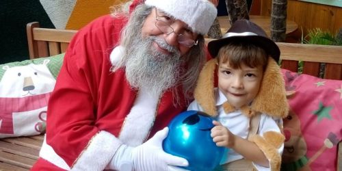 locutor para frente de loja papai noel para festas confraternizacao escolas 760719