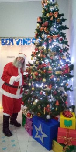 locutor para frente de loja papai noel para festas confraternizacao escolas 760722
