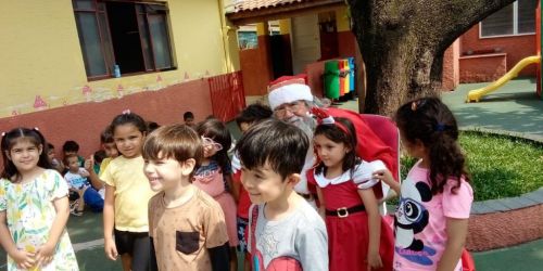 visita do papai noel para a noite do acampamento na escola e  residências   762045