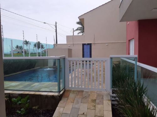 Pé na areia apartamento novo prédio frente ao mar com piscina em Itanhaém 689719