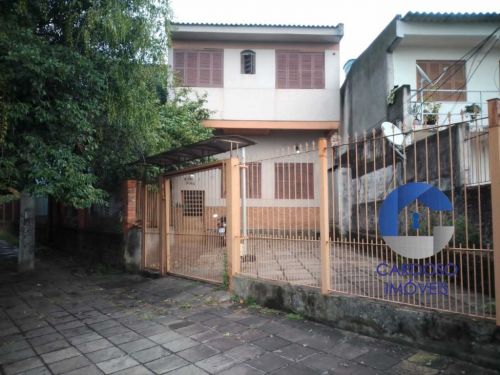 Terreno com casa e 2 apartamentos Bairro Vila Jardim Porto Alegre-rs 771405